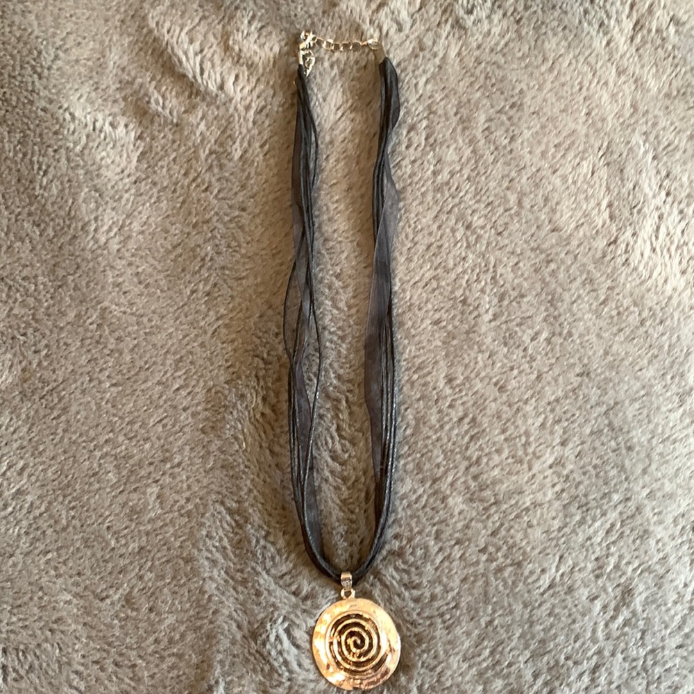 Silver and black ribbon necklace purchased at a boutique in Sedona, AZ